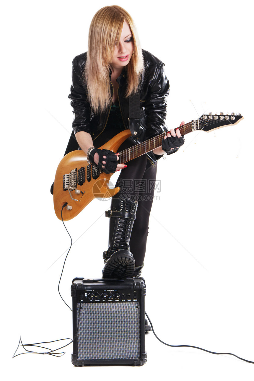 年少女孩玩电吉他音乐会吉他手放大器女孩金发夹克岩石衣服皮革靴子图片