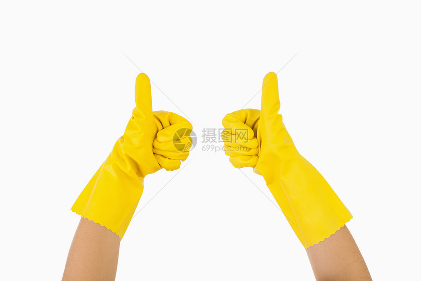 女性手戴手套 举起拇指图片