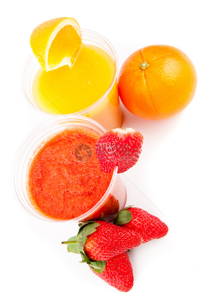 橙和草莓果汁站立图片