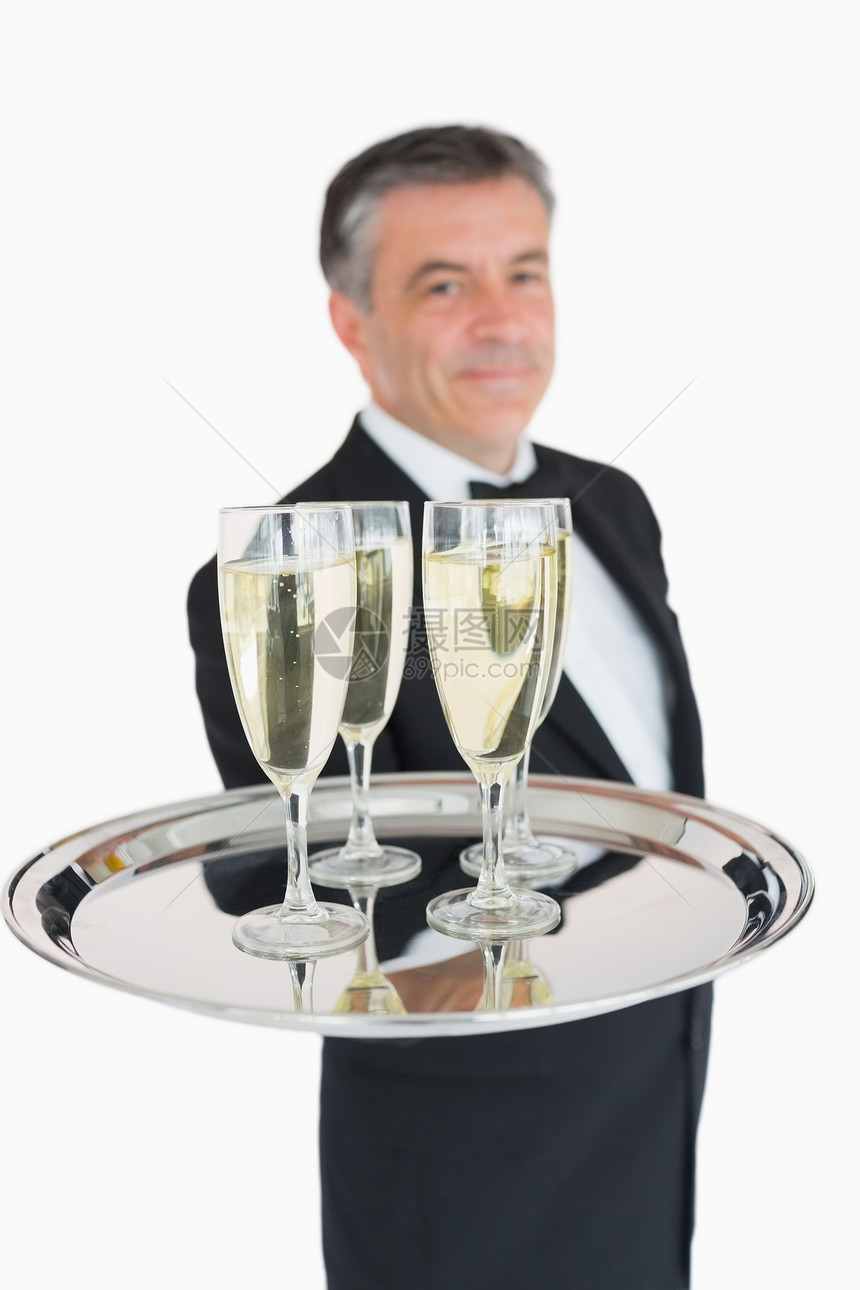 拿着香槟托盘的服务员手套起泡长笛玻璃银盘奢华服务头发衬衫衣冠图片