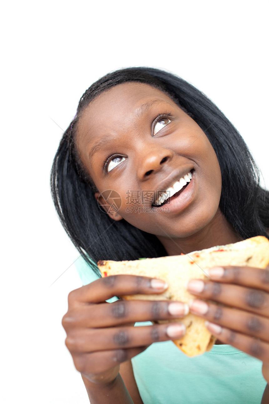 快乐的年轻女人吃三明治微笑小吃健康饮食青少年午餐女士蔬菜时间营养食物图片