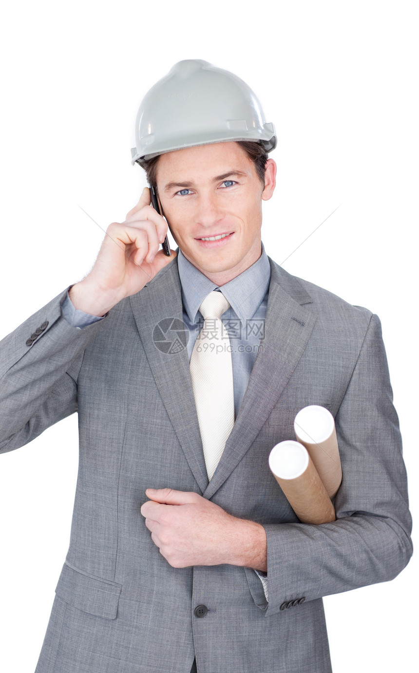 电话上迷人的男性建筑师建筑安全承包商领班商业安全帽讲话构造组织男人图片