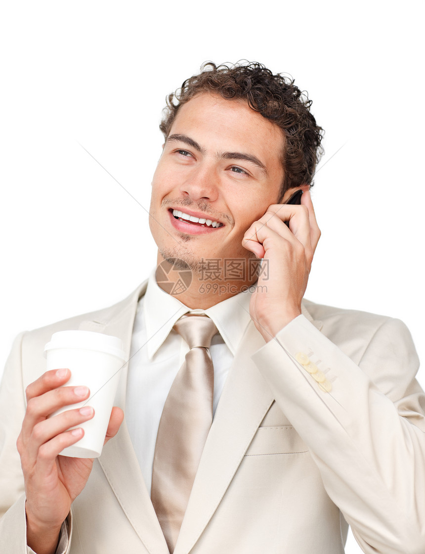 年轻商务人士在喝咖啡时打来电话图片