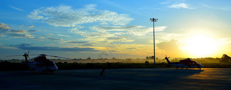 停机坪直升机休整围裙蓝色阴影橙子天空背景图片
