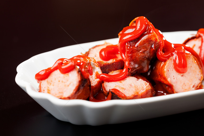 缝合了德国的香肠香料红色垃圾宏观烧烤粉末小吃图片
