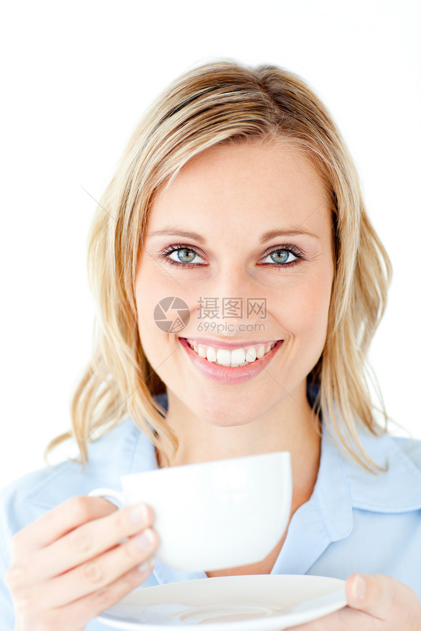 迷人的女商务人士享受她的咖啡图片