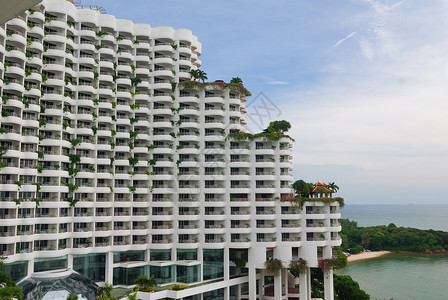 酒店旅馆假期海滩建筑学天空商业天际旅行热带蓝色建筑背景图片