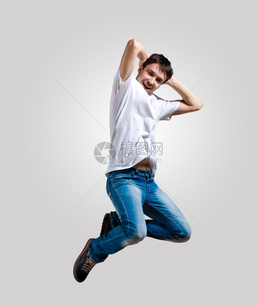 青年男子跳舞和跳跃有氧运动艺术运动男性男生音乐姿势行动体操俱乐部图片