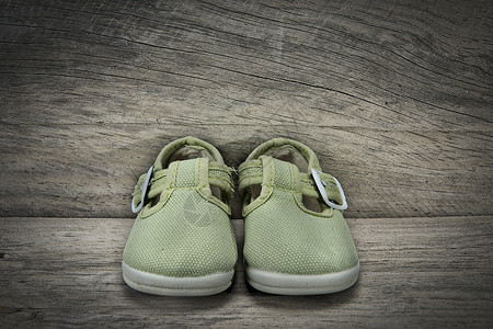 婴儿绿鞋背景图片