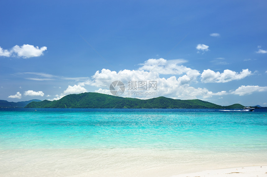 海滩天空蓝色海洋黄色海岸线旅行热带海浪地平线海景图片