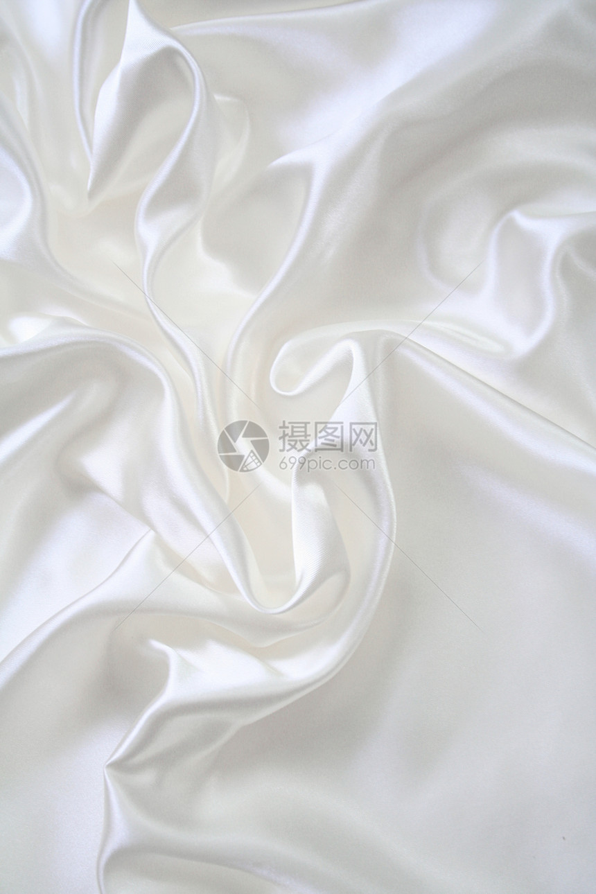 平滑优雅的白色丝绸涟漪投标海浪曲线银色材料折痕织物纺织品布料图片