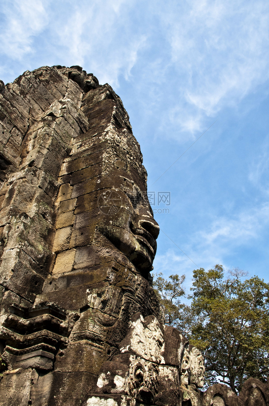 拜顿寺庙面孔 昂哥瓦的石头雕刻脸部 坎波迪微笑艺术高棉语建筑学佛教徒纪念碑上帝废墟宗教雕像图片
