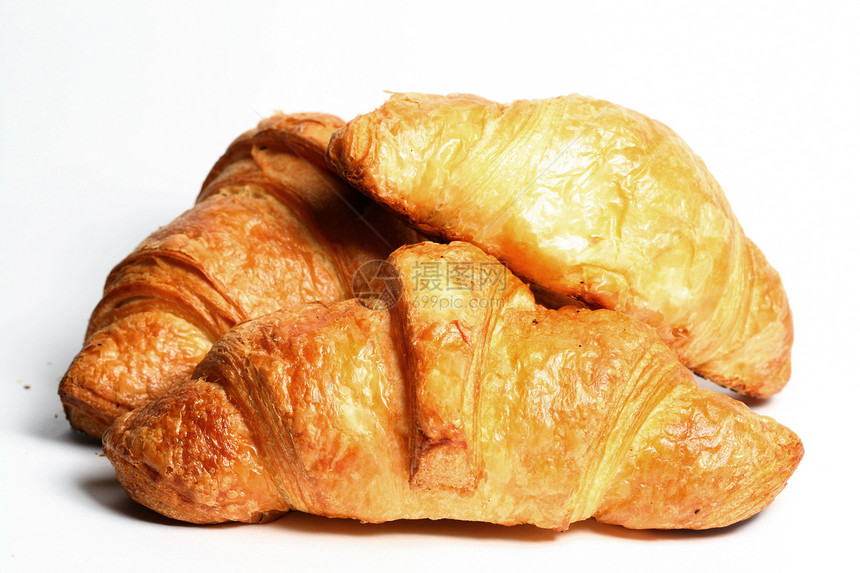 Croissunt 孔滴包子美食传统面包早餐食物白色糕点羊角黄油图片