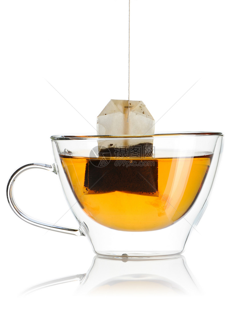 热茶液体黑色玻璃黄色茶包饮料草本餐具白色叶子图片