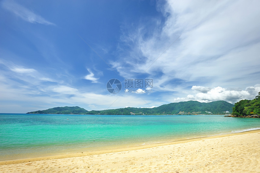 海滩地平线海浪旅行黄色海景蓝色游客海洋海岸线风景图片