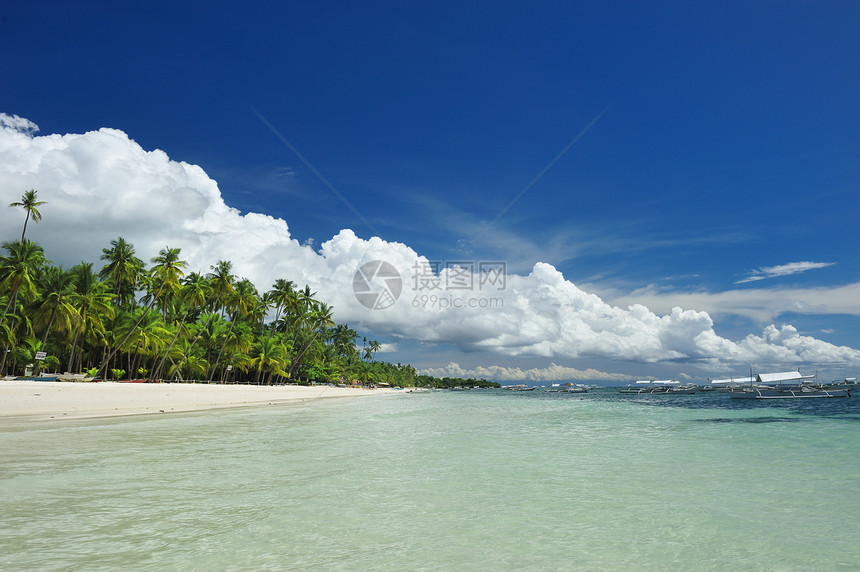 美丽的海滩海景地平线棕榈天空荒野海洋旅行热带海岸线边缘图片