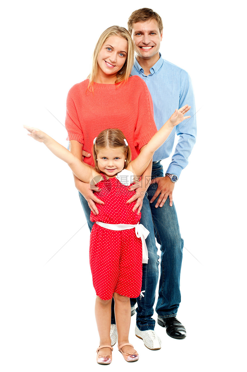 3个家的幸福家庭在室内摆姿势图片
