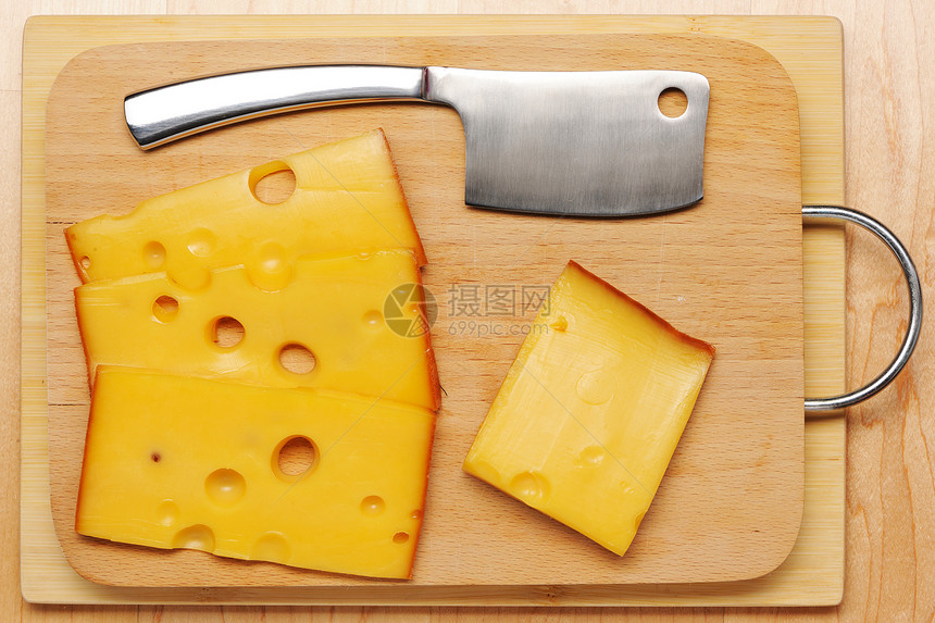 瑞士奶酪和刀静物小吃黄色产品食物奶制品木板图片