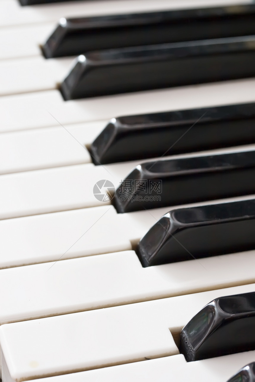 旧钢琴键盘旋律音乐黑色钥匙宏观电子歌曲笔记乐器白色图片