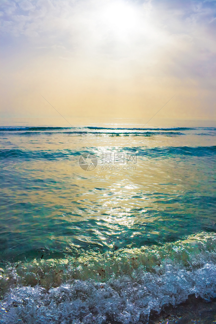 拉辛塔海滩支撑阳光旅游日落海浪海景享受海洋海岸蓝色图片