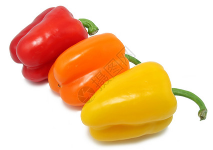 贝尔胡椒黄色活力橙子食物蔬菜红色白色绿色背景图片