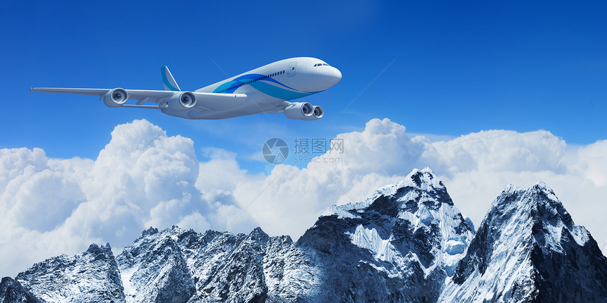 高山上空的白色客机地形高度飞机太阳晴天阳光翅膀空气涡轮旅游图片