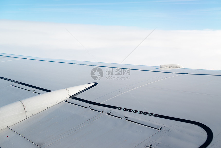 飞机机翼客机空气窗户天空航空公司假期蓝色航班运输车辆图片