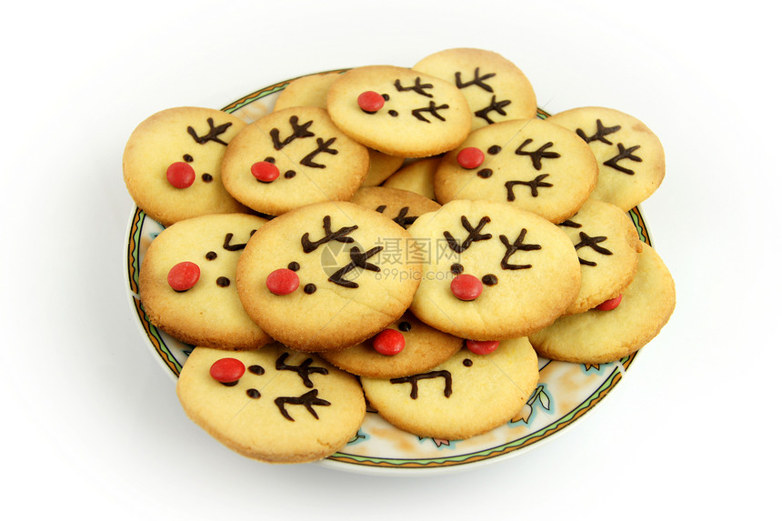 圣诞驯鹿饼干在盘上圆形巧克力白色糖果食物季节性香气商品图片