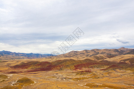 化石山丘油漆山丘土地红色悬崖峡谷石层岩石化石水平山岗图像背景