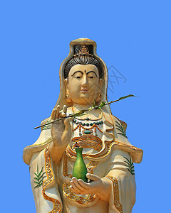 中国女神天空文化场景女性雕塑上帝怜悯雕像传统蓝色背景图片