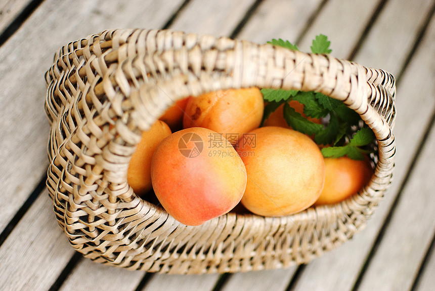 美圆静物叶子桌子水果篮子饮食木篮团体柳条橙子图片