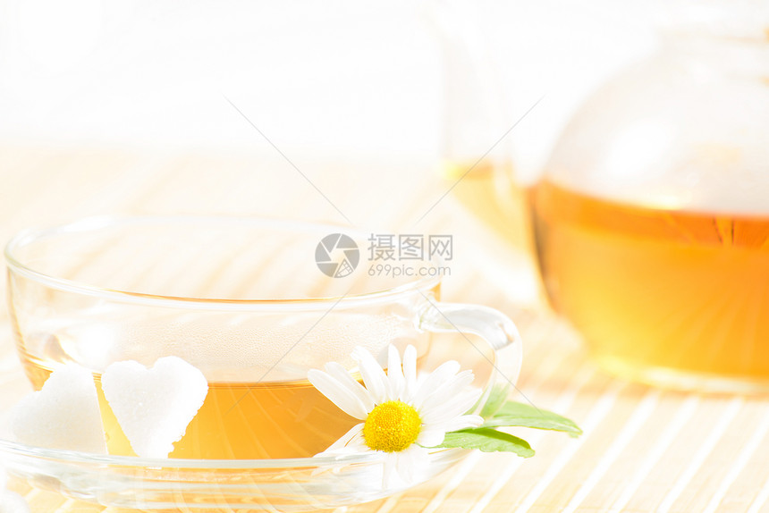 茶杯加香草甘菊茶时间温泉草本植物雏菊叶子礼物橙子照片杯子服务图片