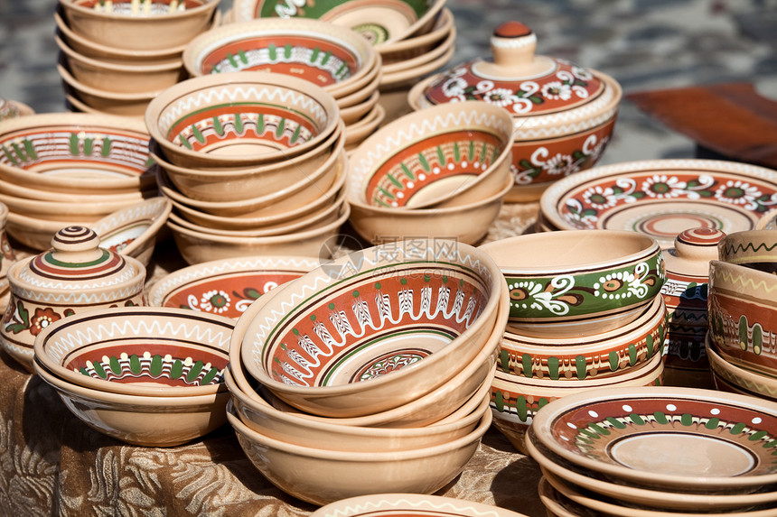 手工艺品市场上的装饰陶瓷收藏水壶装饰品乡村手工业店铺桌子盘子黏土工艺纪念品图片