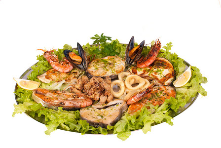 帕里利亚达和marisco巴里拉达乌贼服务鱿鱼圈午餐美食贝类对虾背景