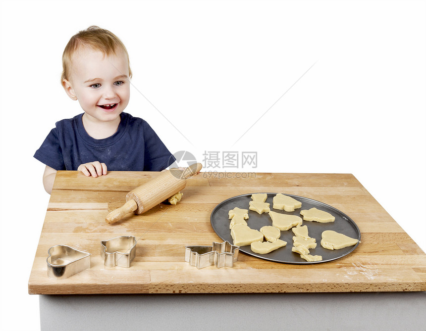 儿童做饼干擀面杖厨房家庭甜食烘烤桌子食物糕点面粉面团图片