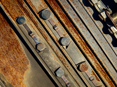 金属冶金材料螺栓风化衰变腐蚀工业机械背景图片