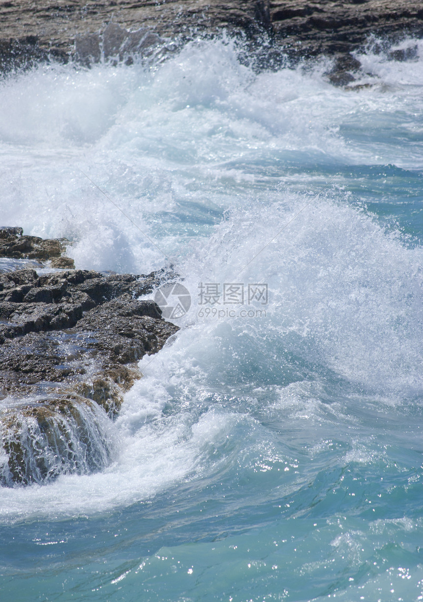 波浪白色晴天石头天堂岩石海洋蓝色阳光热带旅行图片