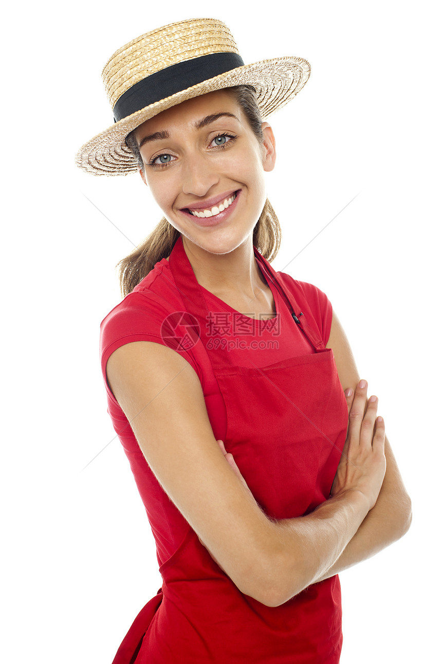 身戴草保龄球帽的烘烤面包师妇女图片