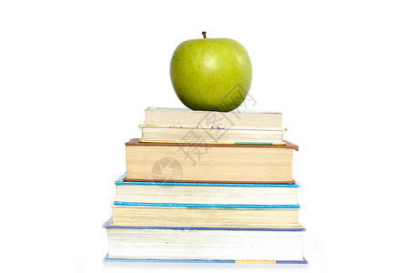 堆叠的书本学校绿色水果生产教育生活图书白色背景图片