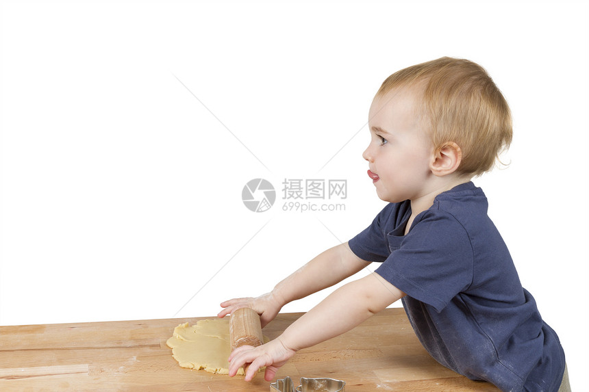 儿童做饼干婴儿营养品家庭糕点擀面杖蛋糕食物面团孩子桌子图片