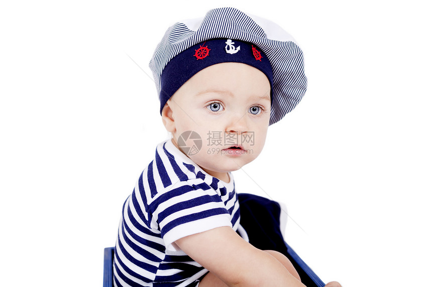 玩水手时装的可爱小宝宝皮肤海洋戏服眼睛微笑喜悦孩子蓝色快乐新生图片