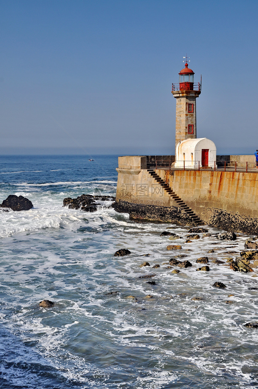 波尔图灯塔葡萄牙海洋天空历史性石头历史蓝色地标支撑信号海浪图片