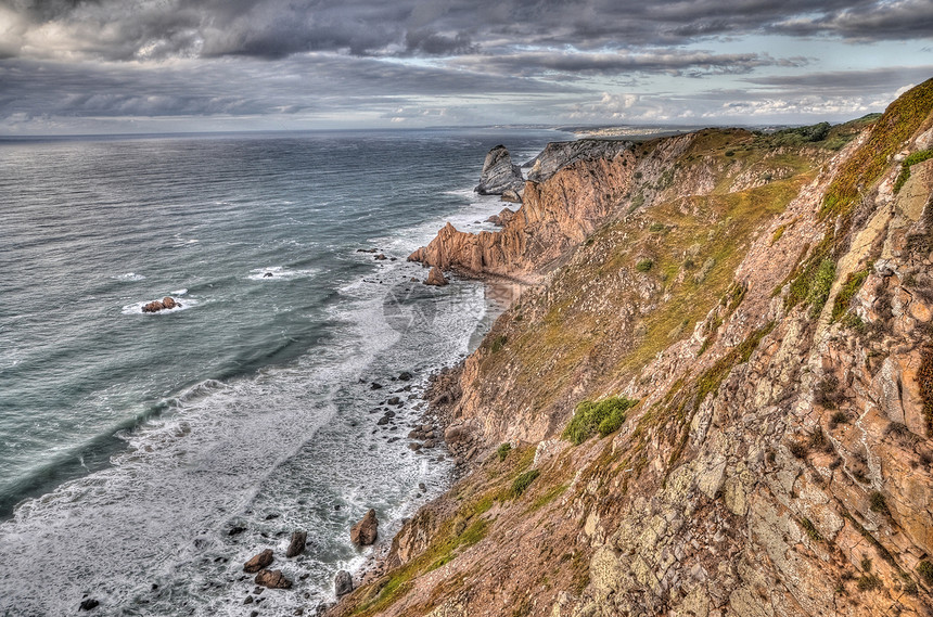 海边岩悬崖葡萄牙地标海岸旅游爬坡旅行场景全景力量海滩日出图片