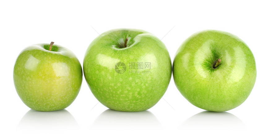 三个孤立的绿苹果图片