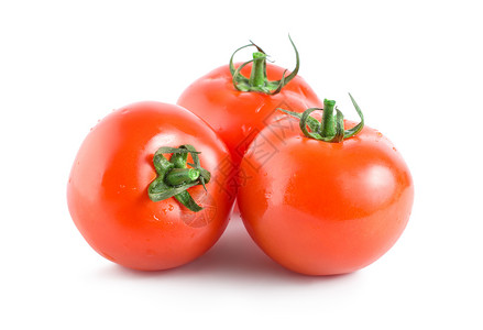 三个红西红番茄被隔离高清图片
