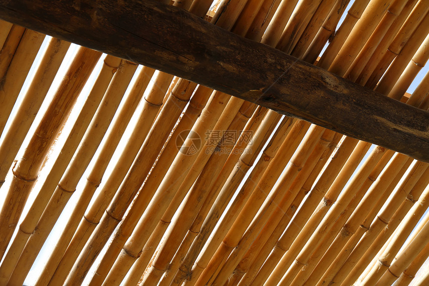 竹屋顶热带旅游小屋太阳棕色材料庇护所乡村芦苇建造图片