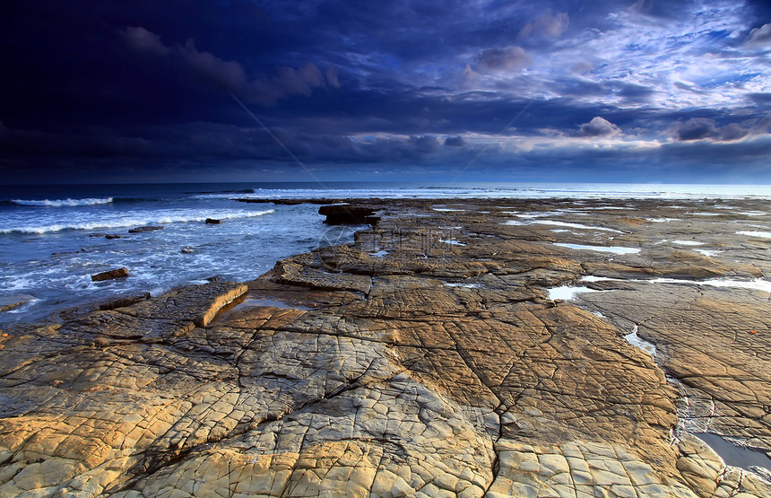 金梅里奇湾天空旅行海浪海岸目的地风景旅游日落蓝色岩石图片