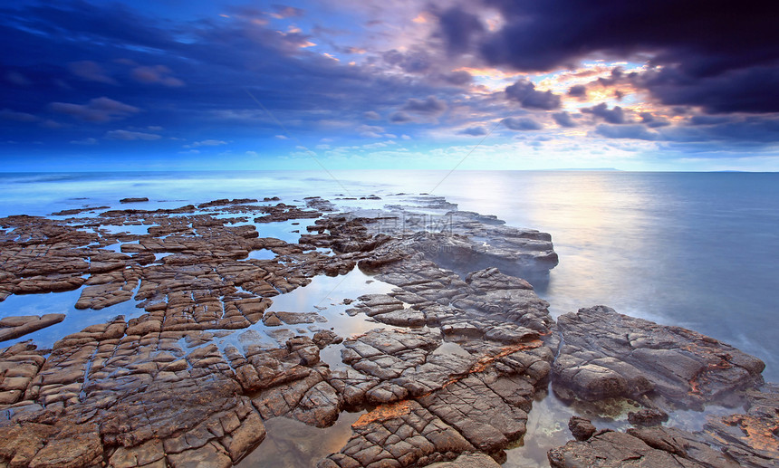 金梅里奇湾海滩海岸线旅行侏罗纪海浪天空风景岩石日落蓝色图片