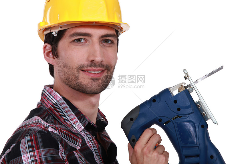 手持乐队锯的男子男人织物力量工人机器男性手指作坊框架木板图片