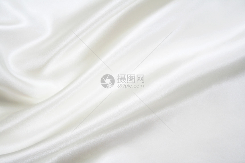 平滑优雅的白色丝绸作为背景投标纺织品布料涟漪婚礼折痕材料银色感性曲线图片